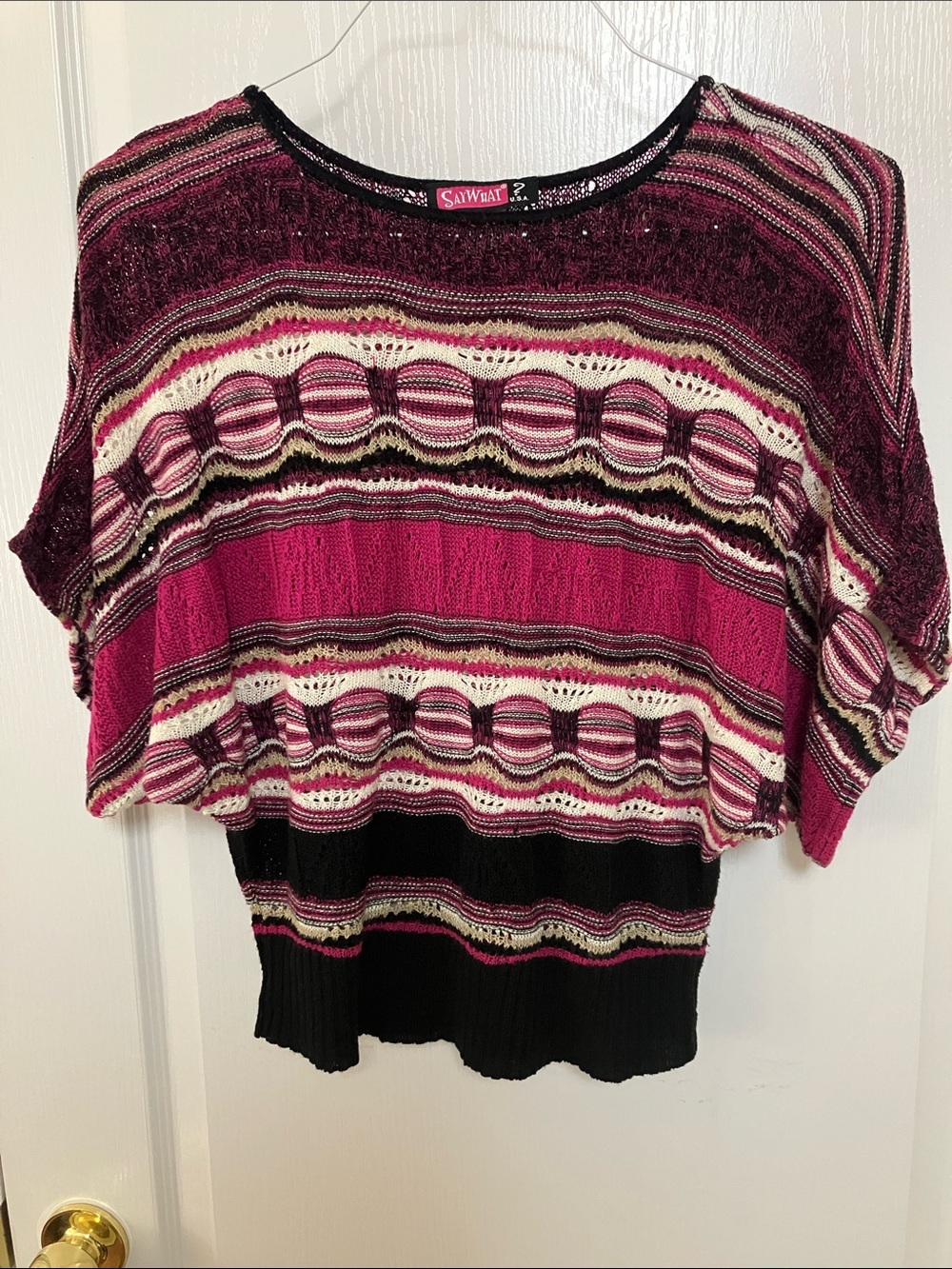 Pink and black batwing sweater